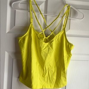 Express Criss cross yellow crop tank